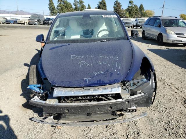 Photo 5 from auction – 2023 TESLA MODEL Y with VIN 7SAYGDEE7PF628033