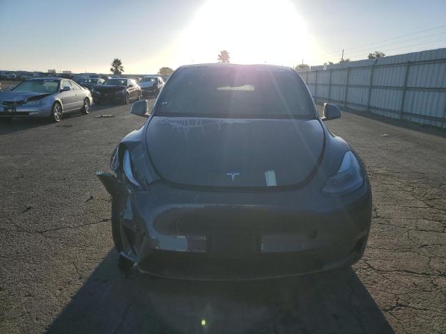 Photo 5 from auction – 2023 TESLA MODEL Y with VIN 7SAYGDED9PF967321