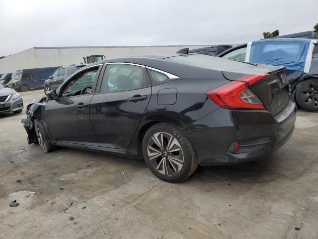 Photo 2 from auction – 2017 HONDA CIVIC EXL with VIN 2HGFC1F70HH656140