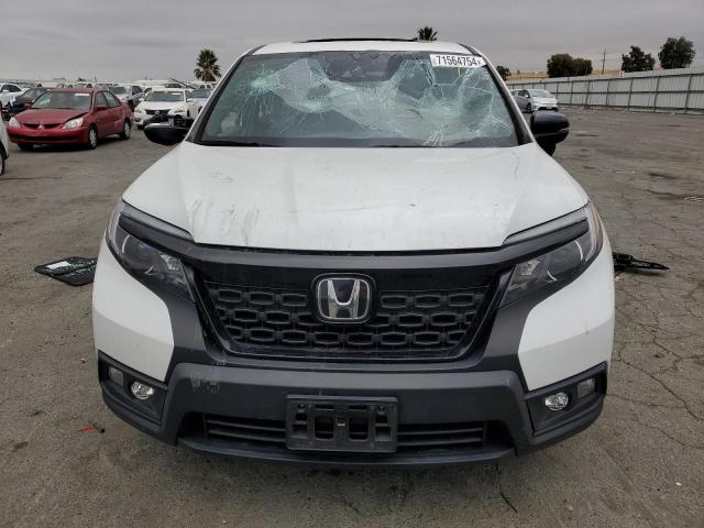Photo 5 from auction – 2021 HONDA PASSPORT E with VIN 5FNYF7H51MB014345