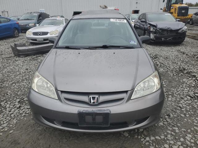 Photo 5 from auction – 2004 HONDA CIVIC LX with VIN 2HGES166X4H542579