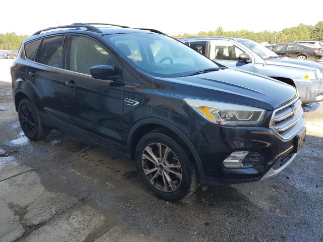 Photo 4 from auction – 2017 FORD ESCAPE SE with VIN 1FMCU9GDXHUD73187