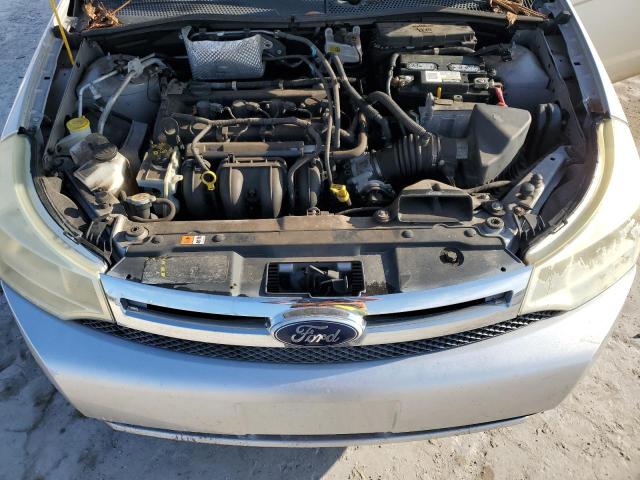 Photo 11 from auction – 2011 FORD FOCUS SE with VIN 1FAHP3FN1BW119152