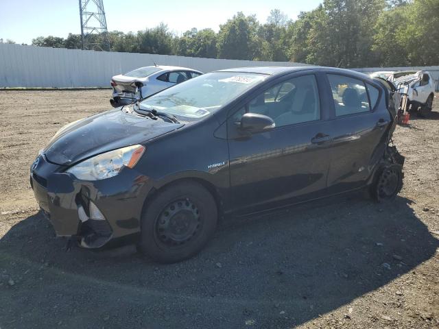 TOYOTA PRIUS C 2014 with VIN JTDKDTB31E1064328 - Photo from auction