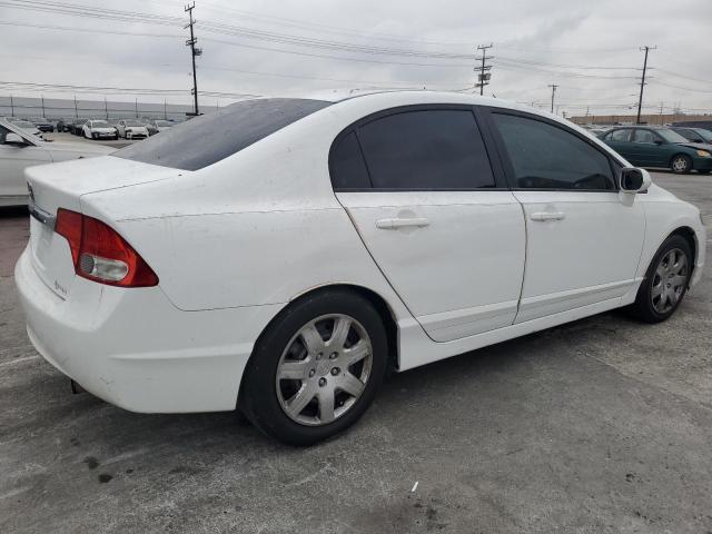 Photo 3 from auction – 2011 HONDA CIVIC with VIN 19XFA1F5XBE014210