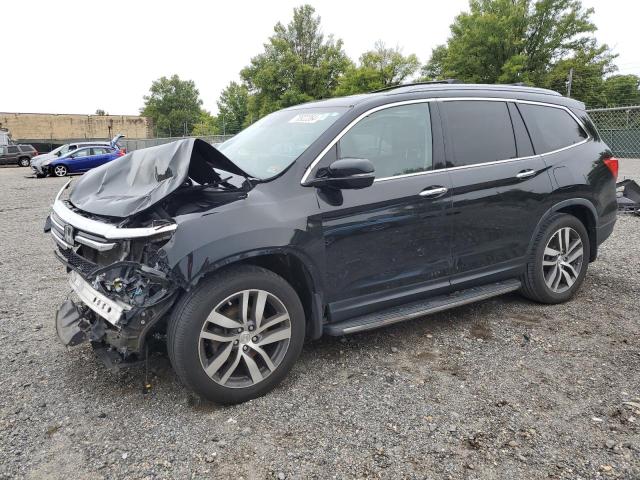 HONDA PILOT ELIT 2016 with VIN 5FNYF6H05GB063194 - Photo from auction