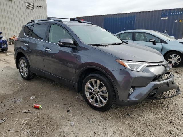 Photo 4 from auction – 2018 TOYOTA RAV4 LIMIT with VIN JTMDFREV4JD234418