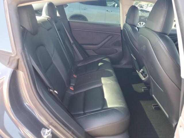 Photo 10 from auction – 2021 TESLA MODEL 3 with VIN 5YJ3E1EB4MF877242