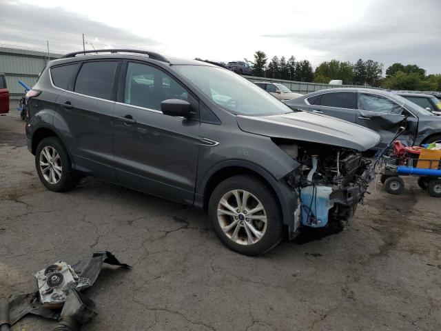 Photo 4 from auction – 2018 FORD ESCAPE SE with VIN 1FMCU9GDXJUB02572