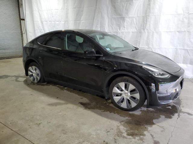 Photo 4 from auction – 2023 TESLA MODEL Y with VIN 7SAYGDEE1PA119570