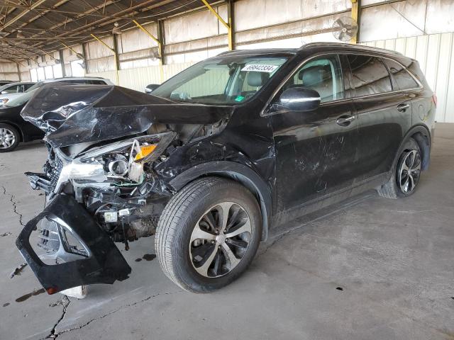KIA SORENTO EX 2016 with VIN 5XYPH4A11GG094674 - Photo from auction