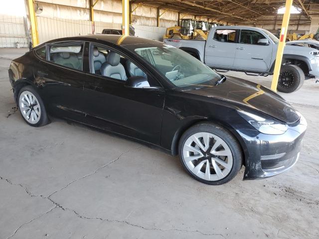 Photo 4 from auction – 2022 TESLA MODEL 3 with VIN 5YJ3E1EA3NF303997
