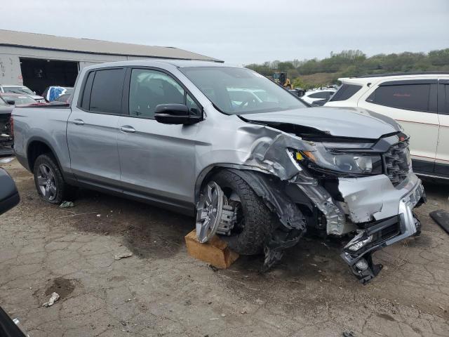 Photo 4 from auction – 2024 HONDA RIDGELINE with VIN 5FPYK3F64RB016542