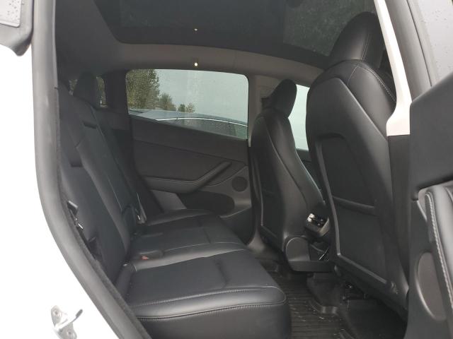 Photo 11 from auction – 2023 TESLA MODEL Y with VIN 7SAYGDEEXPF807215