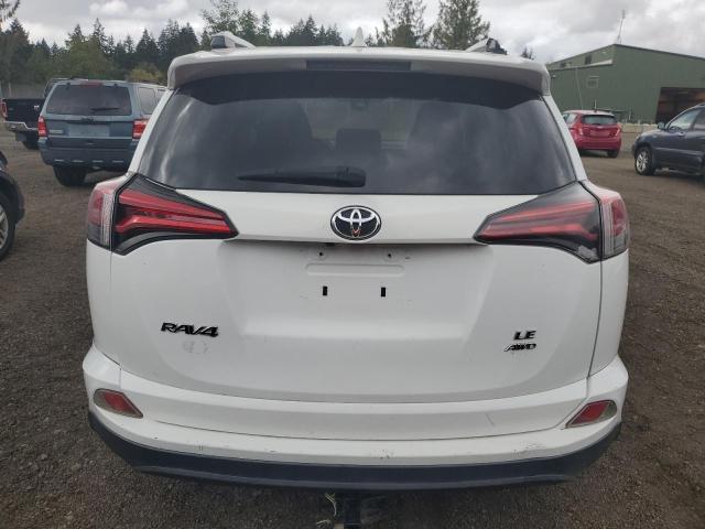 Photo 6 from auction – 2018 TOYOTA RAV4 LE with VIN 2T3BFREV1JW727967