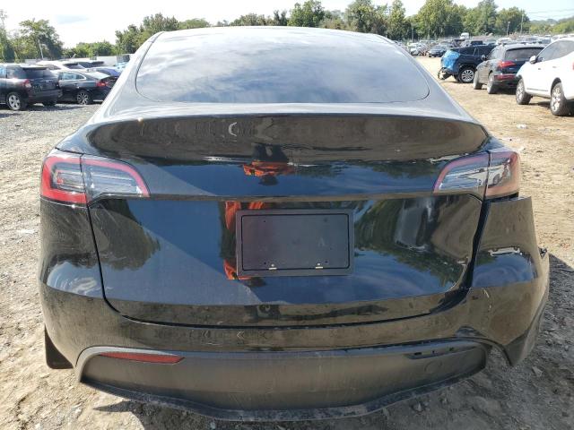 Photo 6 from auction – 2023 TESLA MODEL Y with VIN 7SAYGDEE4PF691672