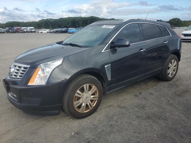 CADILLAC SRX LUXURY 2014 with VIN 3GYFNEE36ES614301 - Photo from auction