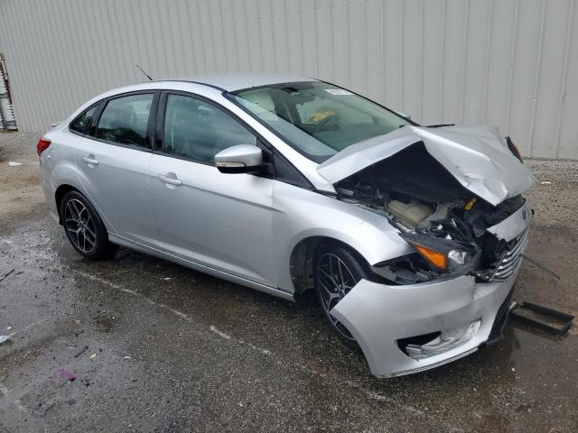 Photo 4 from auction – 2015 FORD FOCUS SE with VIN 1FADP3F23FL216039