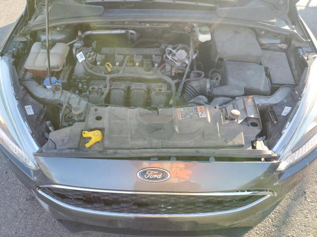 Photo 11 from auction – 2017 FORD FOCUS S with VIN 1FADP3E22HL308439