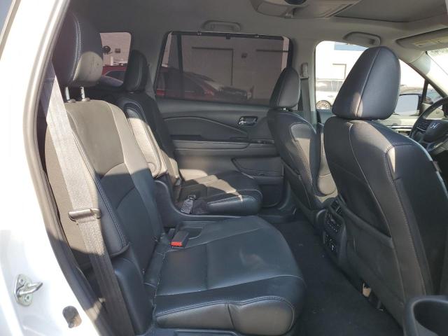 Photo 11 from auction – 2021 HONDA PILOT TOUR with VIN 5FNYF5H69MB001307