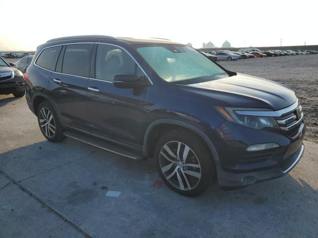 Photo 4 from auction – 2016 HONDA PILOT ELIT with VIN 5FNYF6H03GB105877