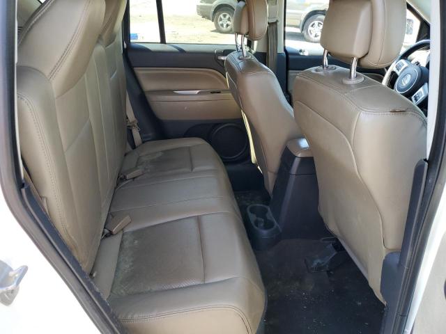 Photo 10 from auction – 2014 JEEP COMPASS with VIN 1C4NJCCB6ED769863