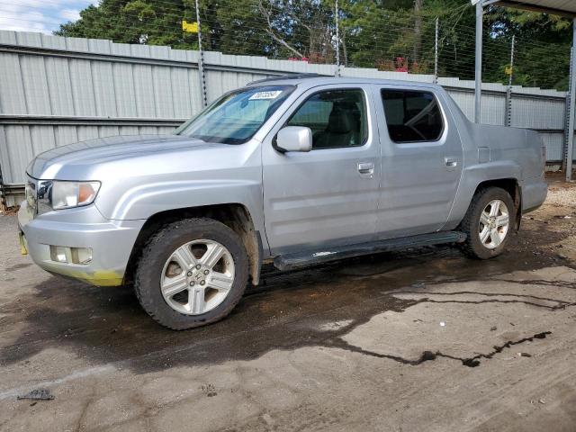 HONDA RIDGELINE 2011 with VIN 5FPYK1F57BB007478 - Photo from auction