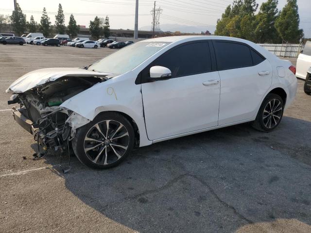 TOYOTA COROLLA L 2018 with VIN 5YFBURHE5JP836931 - Photo from auction