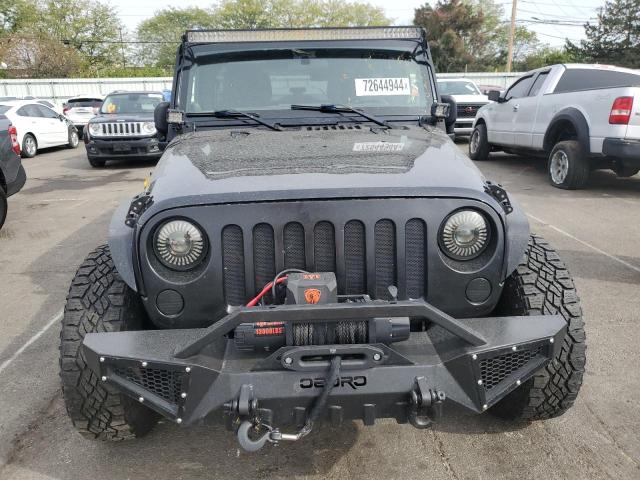 Photo 5 from auction – 2011 JEEP WRANGLER U with VIN 1J4BA3H14BL566632