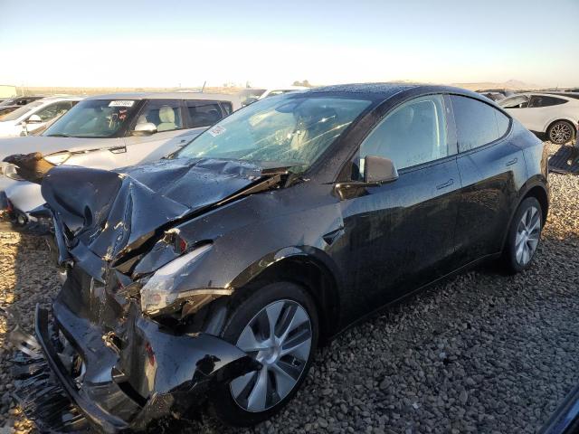TESLA MODEL Y 2024 with VIN 7SAYGAEE6RF071388 - Photo from auction