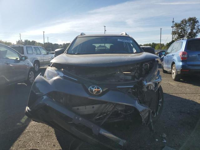 Photo 5 from auction – 2018 TOYOTA RAV4 LE with VIN JTMBFREV7JJ747459