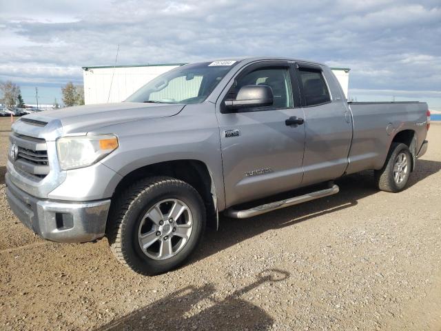 TOYOTA TUNDRA DOU 2014 with VIN 5TFCY5F16EX017533 - Photo from auction
