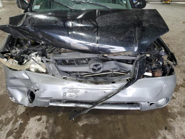 Photo 12 from auction – 2001 MAZDA TRIBUTE LX with VIN 4F2YU08101KM70507