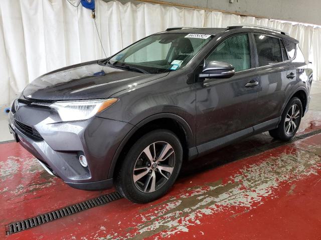 TOYOTA RAV4 XLE 2016 with VIN 2T3RFREV4GW421272 - Photo from auction