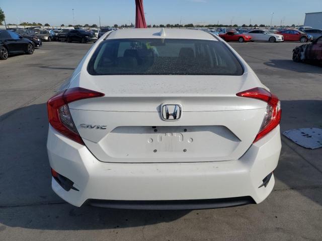 Photo 6 from auction – 2018 HONDA CIVIC EX with VIN 19XFC2F70JE038905