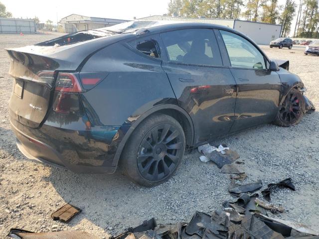 Photo 3 from auction – 2022 TESLA MODEL Y with VIN 7SAYGDEE1NF340182