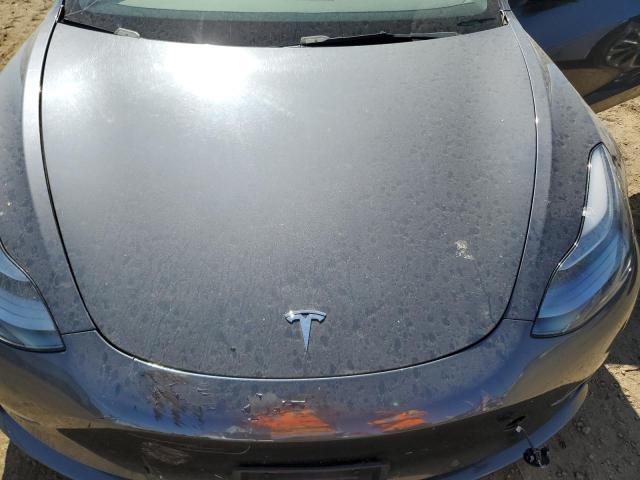 Photo 11 from auction – 2022 TESLA MODEL 3 with VIN 5YJ3E1EA4NF142706