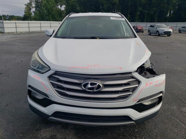 Photo 5 from auction – 2017 HYUNDAI SANTA FE S with VIN 5NMZU3LB8HH018848