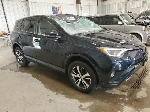 Photo 4 from auction – 2017 TOYOTA RAV4 XLE with VIN 2T3RFREV6HW663742