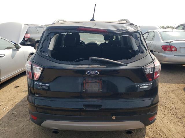 Photo 6 from auction – 2018 FORD ESCAPE TIT with VIN 1FMCU0J93JUA58401
