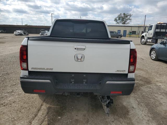 Photo 6 from auction – 2020 HONDA RIDGELINE with VIN 5FPYK3F78LB018715