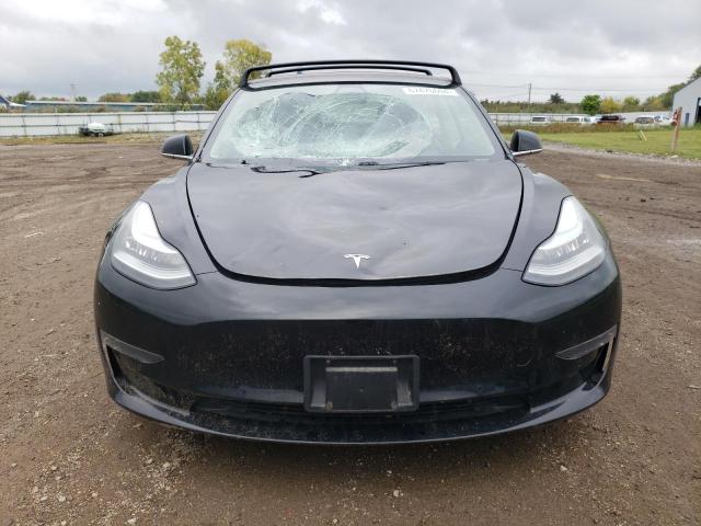 Photo 5 from auction – 2018 TESLA MODEL 3 with VIN 5YJ3E1EB9JF068511
