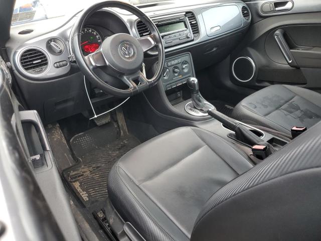 Photo 8 from auction – 2012 VOLKSWAGEN BEETLE with VIN 3VWJP7AT8CM639713