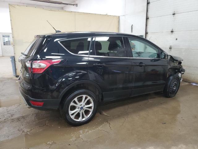Photo 3 from auction – 2017 FORD ESCAPE SE with VIN 1FMCU9GD1HUD18871