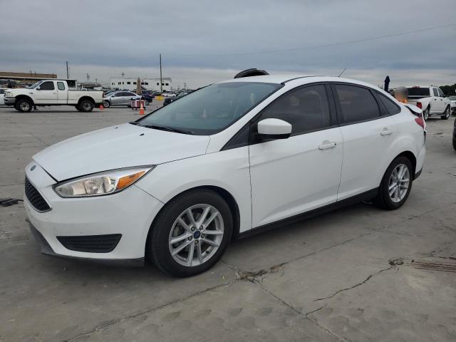 FORD FOCUS SE 2018 with VIN 1FADP3F28JL286855 - Photo from auction
