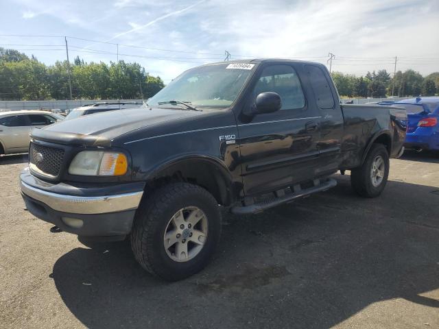 FORD F150 2002 with VIN 1FTRX18L12NA99568 - Photo from auction