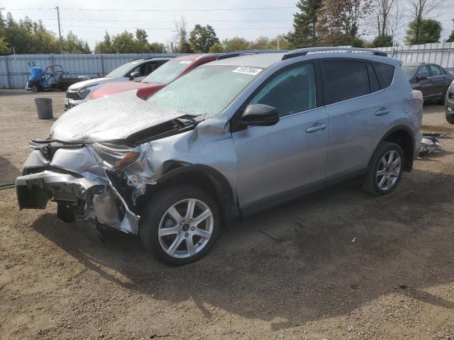 Photo 1 from auction – 2018 TOYOTA RAV4 LE with VIN 2T3ZFREV9JW482754