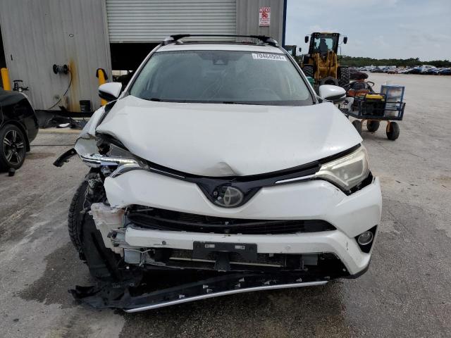Photo 5 from auction – 2016 TOYOTA RAV4 LIMIT with VIN JTMDFREV2GJ058303