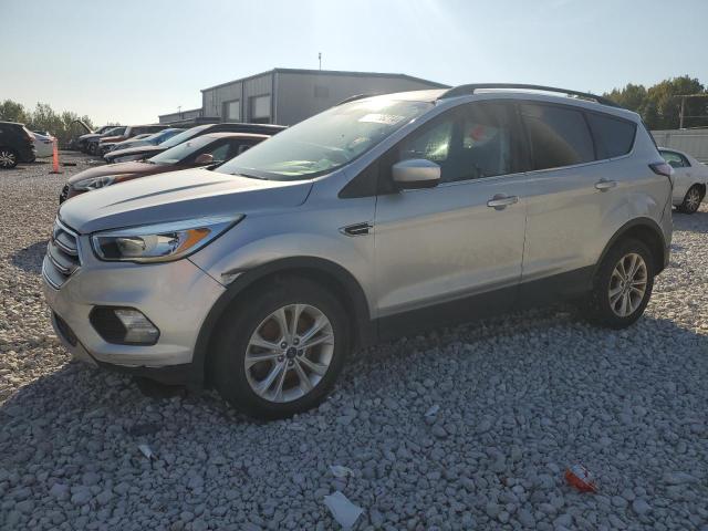 FORD ESCAPE SE 2018 with VIN 1FMCU9GD3JUB15888 - Photo from auction