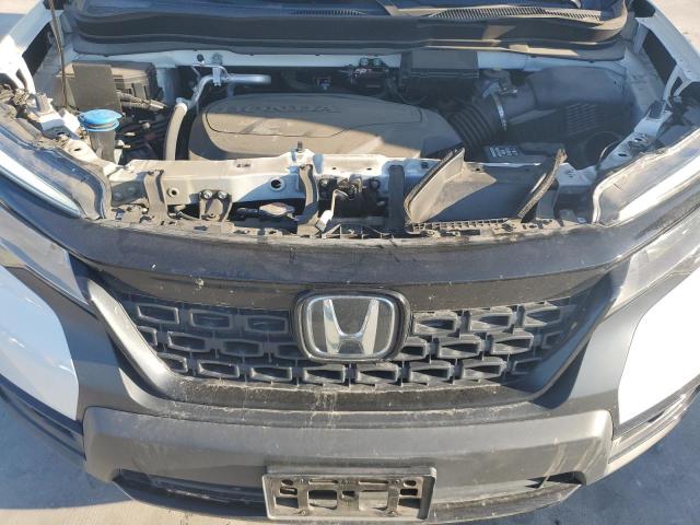 Photo 12 from auction – 2021 HONDA PASSPORT E with VIN 5FNYF8H04MB014544